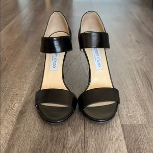 Jimmy Choo black leather pumps